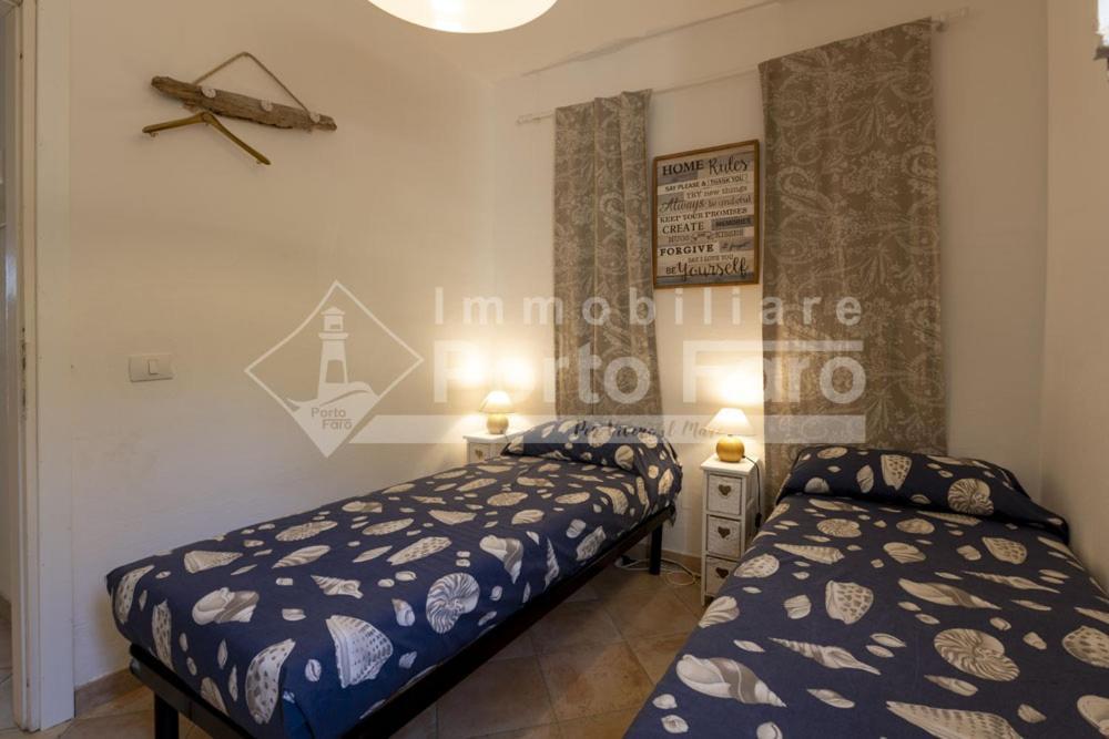 2 Pineta - Ampio Quadrilocale Sulla Spiaggia Di Porto Faro Palau Extérieur photo